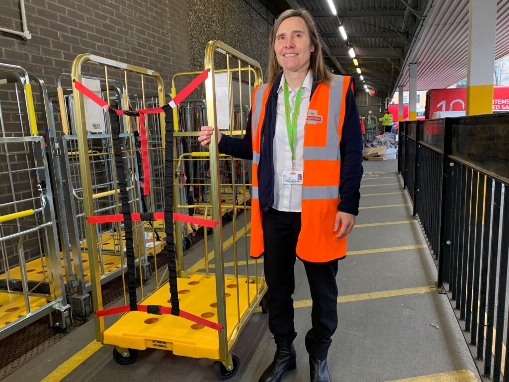 Royal Mail Head of Operations with a York Roll Container