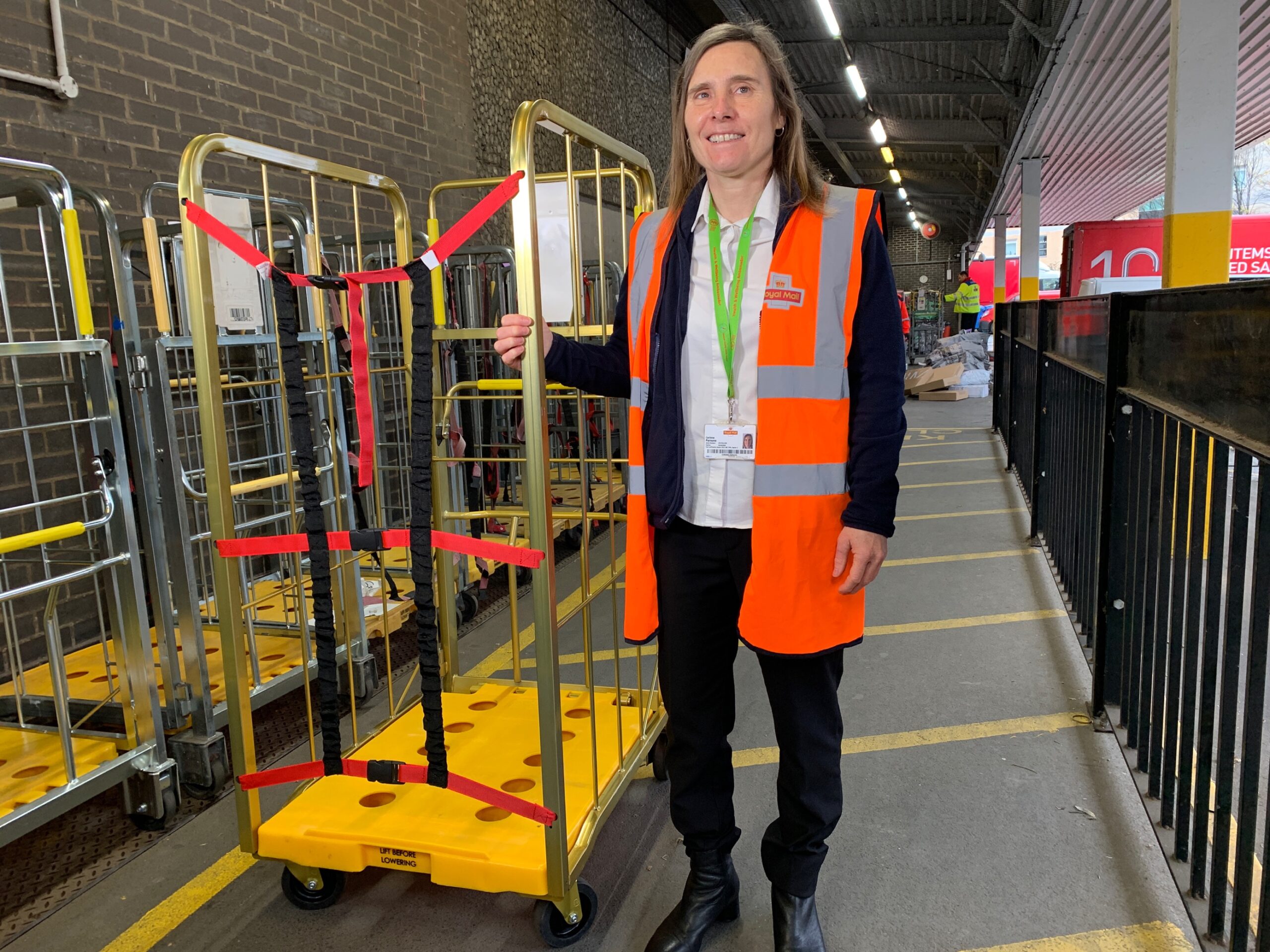 Royal Mail Head of Operations with a York Roll Container